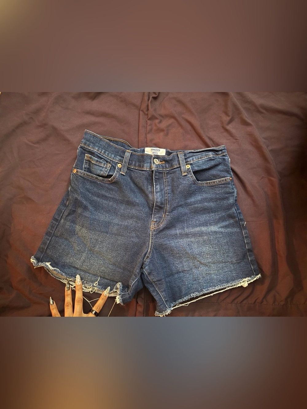 Levi's Blue Denim Cutoff Shorts with Distressed Hem